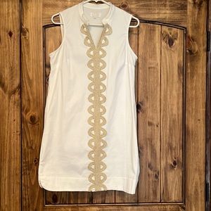 Beautiful summer dress. White with gold detailing.
